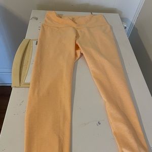 Calia lustalux light orange leggings size large (7/8)
